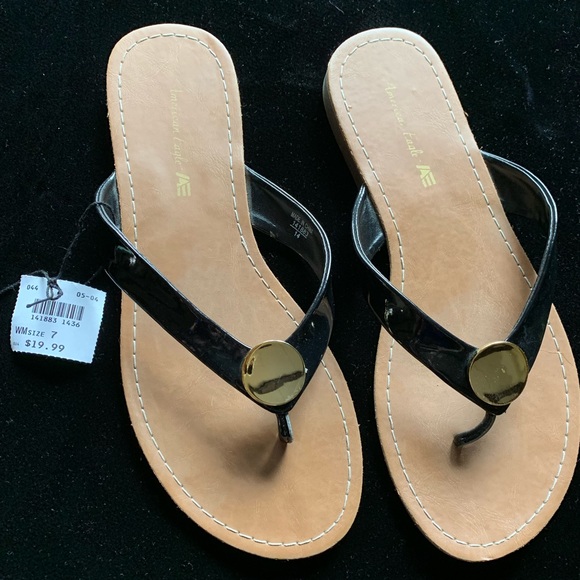 American Eagle By Payless Shoes Black And Gold Flip Flops Poshmark